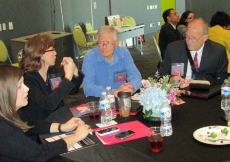 People talking at a table.