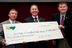 CALS Dean Richard Linton (left) and Dr. Joe Zublena accept the contribution from TTFC's William Upchurch (right).