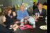 People talking at a table.