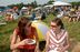 two women eating at the picnic