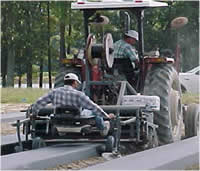 Tractor laying plastic mulch