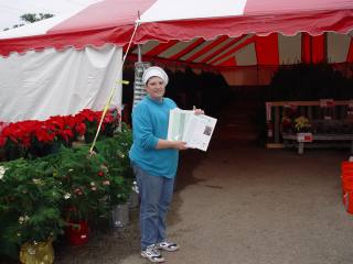 Sales Manager with her Plan Notebook