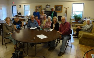 Local photographer, Larry Klug, recently taught a photography class at the Swain County Senior Center. (Left to Right) First Row: Laverne Crawford, Mary Hintz, Charlie King, Gail Barker, Dee Decker and Larry Klug. Second Row: Jeanette Frady, Essie Wiggins. Standing: Pete Gibson, Wanda Cole, Galena Alison. Seated on Couch: Willie Mae Gunter.