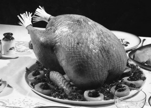An iconic image of a roast turkey from the archives at the D.H. Hill Library at NC State University. Properly carving a turkey adds to any Thanksgiving feast.