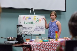 Isabelle Mazure, Coastal Explorers 4-H Club member, demonstrates how to cook a delicious, nutritious crepe.