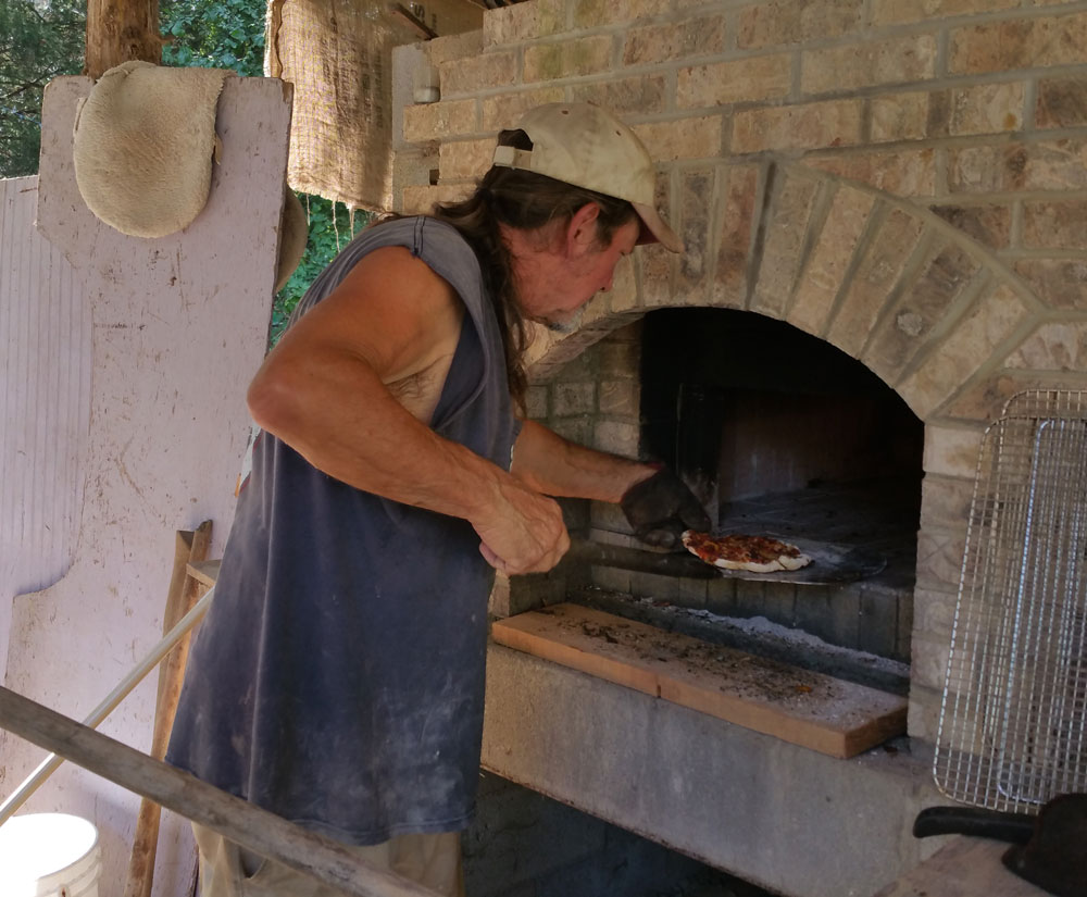 Mike Perry and his crew made delicious wood-fired pizzas from farm veggies.