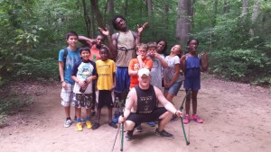 Campers enjoy the company of good friends after mastering the archery range (July 2015).