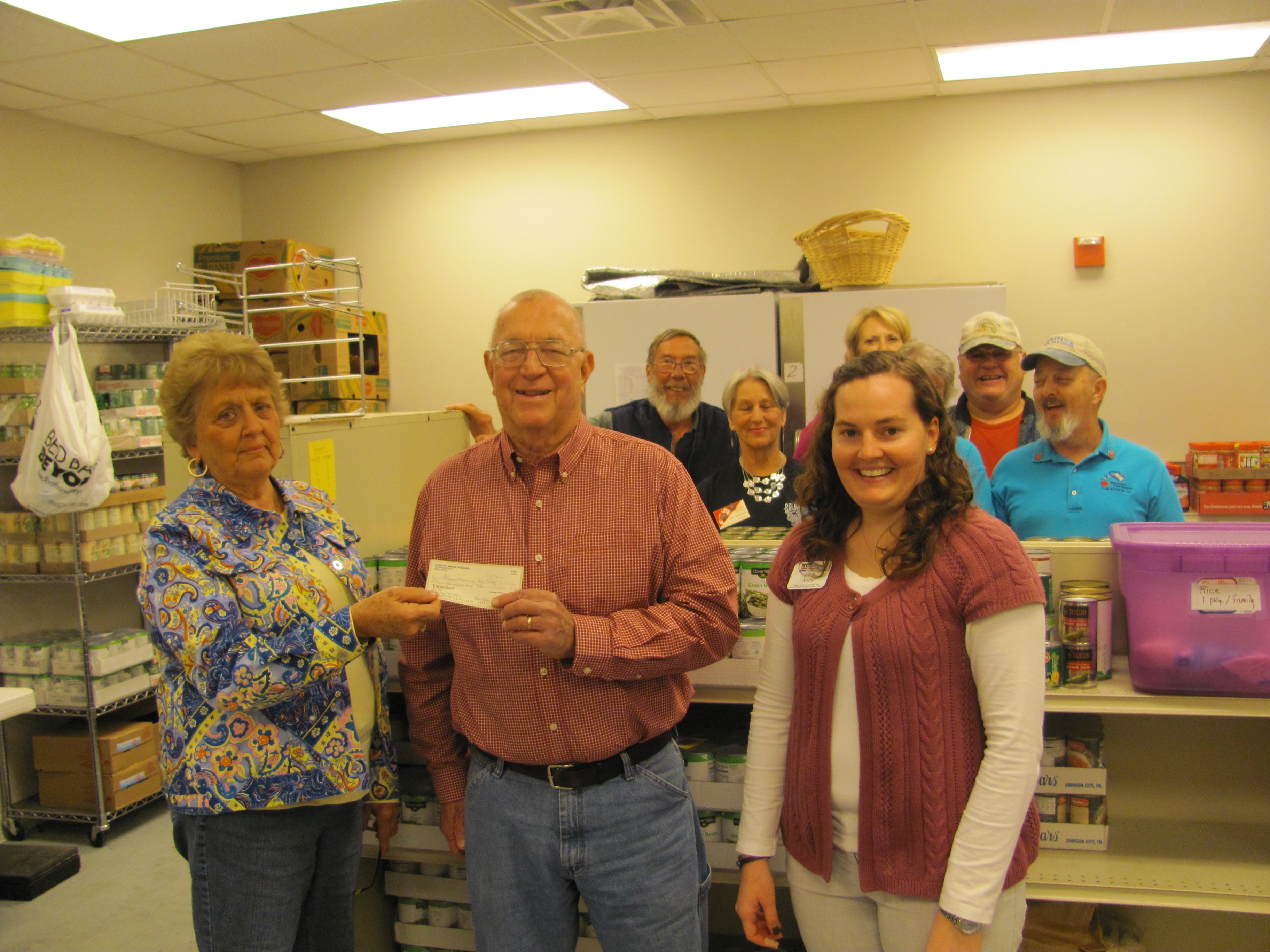 (Back row from left to right) Ken Ferguson, Ann McNamee, Master Gardener President Peggy Lilienthal, Mary Bock, Jim Hoover, and Fred Bock; (Front row from left to right) Master Gardener Treasurer Penny Leary-Smith, Pilmore Food Bank Coordinator Sam Casey, and Agriculture Extension Technician Sarah Watts.