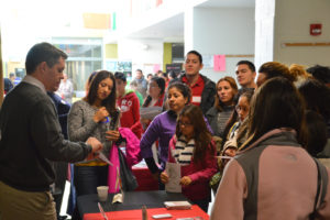 Juntos participants watching an instructor