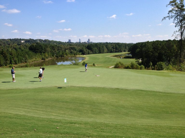 people golfing