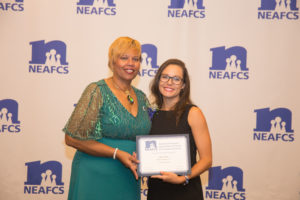 Olivia Patchel receiving award