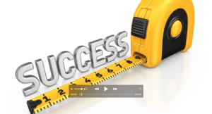 measuring tape with the word success
