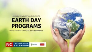 hands holding a small Earth advertising Earth Day Programs