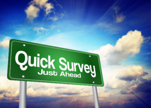picture of sky with billboard say quick survey just ahead