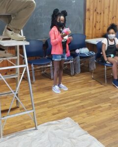 camper showing their egg design