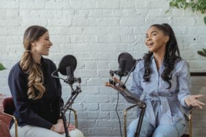 Two young women talking