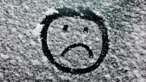 Sad Face in Snow
