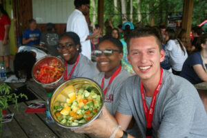 kids with bowls of tomatoes