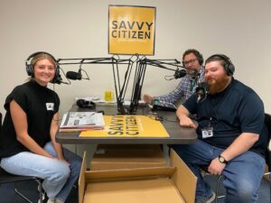 staff conducting monthly podcast