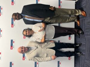 Ivelisse Colón receiving award from Dr. Rich Bonanno and Dr. Ray McKinnie