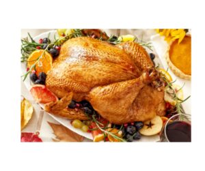 Roasted Turkey with orange slices, rosemary, olives