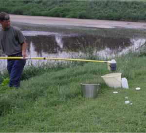 collecting wastewater sample