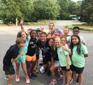 group of campers smiling at camera