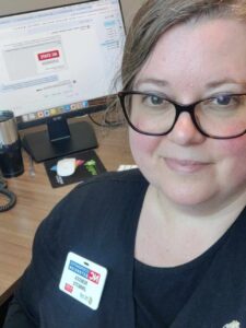 Image of Rebecca Jinnette, the Digital Skills Agent for the Bertie County NC Cooperative Extension, sitting at her desk
