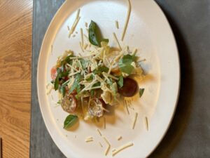 tomato and pasta on plate