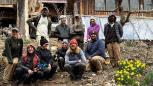 Margaret Bloomquist, research scholar with NC State Extension's NC Alternative Crops and Organics Program, wrapping up a March workday at Mountain Gardens, near Burnsville, N.C.
