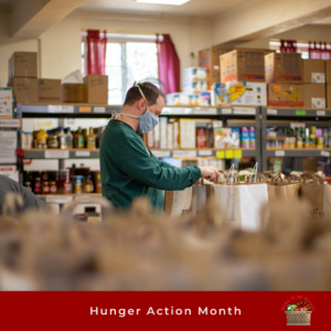 Volunteer labeling food pantry bag