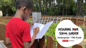 Boy journaling in school garden