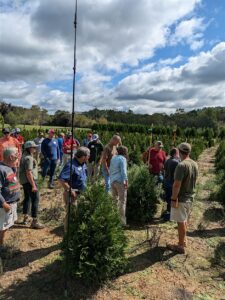 Workshop attendees in a Christmas Tree Field